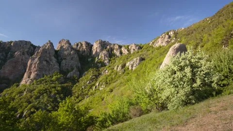 The movement of clouds in the spring in the Crimea peninsula Stock Footage 145389132