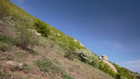 The movement of clouds in the spring in the Crimea peninsula Stock Footage 145389175