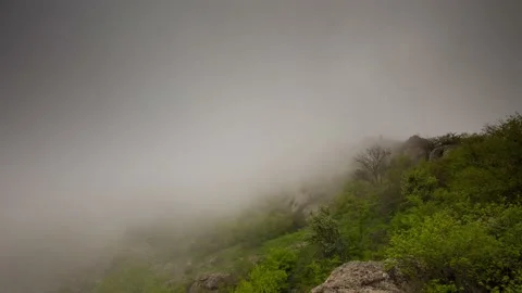 The movement of clouds in the spring in the Crimea peninsula Stock Footage 145389207