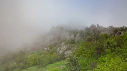 The movement of clouds in the spring in the Crimea peninsula Stock Footage 145389222