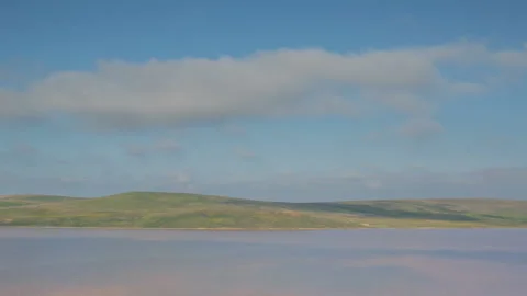 The movement of clouds in the spring in the steppe part of the Crimea peninsula Stock Footage 85510610