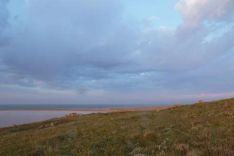 The movement of clouds in the spring in the steppe part of the Crimea peninsu Stock Photos