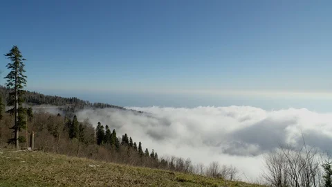 Movement of clouds on the surface of the mountain, fog creeps. timelapse Stock Footage 126995433