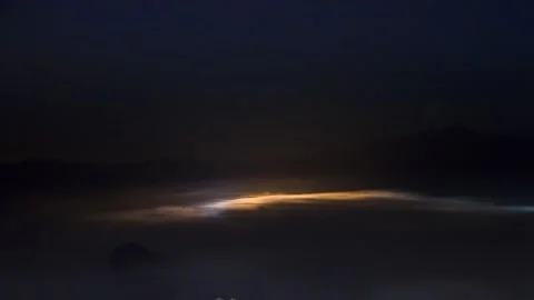 A movement cloudy and star on top  of mountain at night time in winter season Stock Footage 133115961