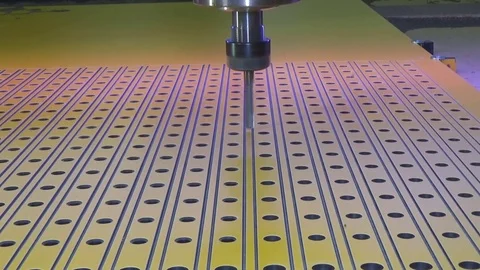The movement of the cnc spindle. Drilling holes in a plastic sheet  Stock Footage 76476014