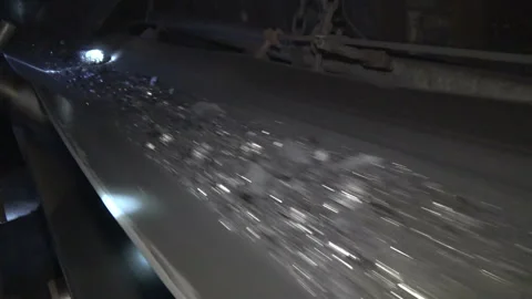 The movement of coal in the mine. Extraction of solid fuel. Heavy industry Stock Footage 94213137