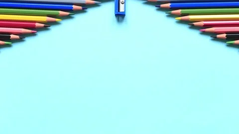 The movement of colored pencils on a blue background. Video stock 159847133