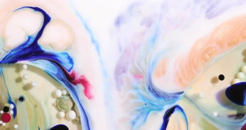 The movement of colors in milk Stock Footage 234969229