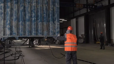 The movement of the container in the paint shop. Stock Footage 104657054