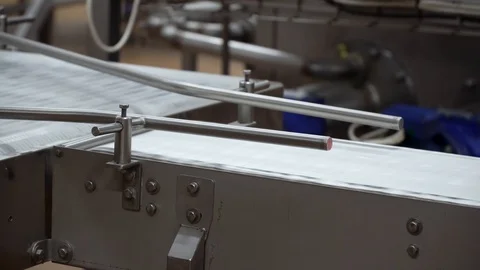 Movement of conveyor belt without objects on it Stock Footage 121226778