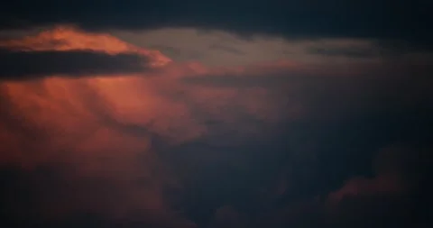 The movement of cumulus clouds at sunset from the midst of rain clouds. Timelaps Video stock 168182228