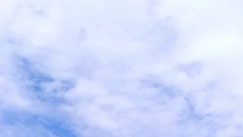 Movement of cumulus continuous clouds on blue beautiful sky, accelerated Stock Footage 146775785