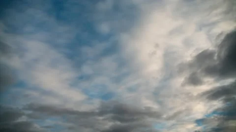 The movement of dark-white clouds across the blue autumn sky. Time lapse. Stock Footage 162396766