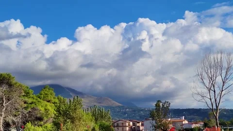 The Movement of a Dense Layer of Clouds Above the Ground.  Stock Footage 220359510