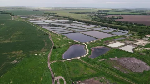 Movement of the drone along many artificial reservoirs. Stock Footage 155705880