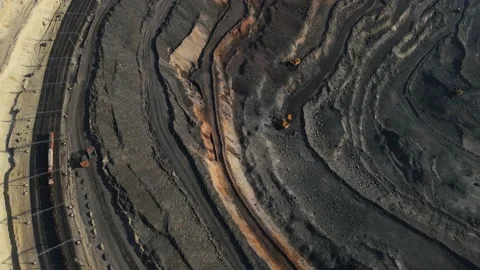 Movement of a drone flying over a mountain quarry Stock Footage 158683322