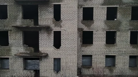 Movement of the drone horizontally along an abandoned house without glass on the Stock Footage 160103495