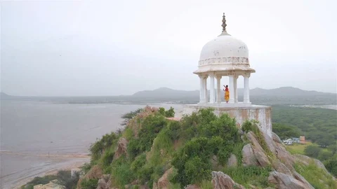 Movement drone shot of a Classical Indian dancer dancing in marble tomb Stock Footage 96525516