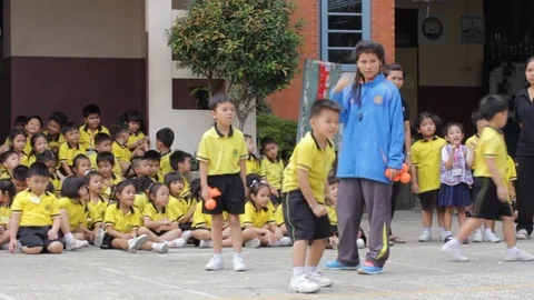 Movement education teaching kindergarten. Students are joyful Stock Footage 72168717