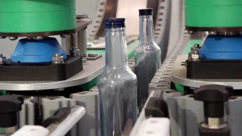 The movement of empty bottles along the conveyor belt. Stock Footage 166561007