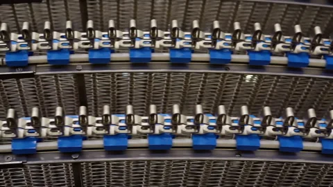 The movement of an empty conveyor line for the production of bakery products. Stock Footage 151109099
