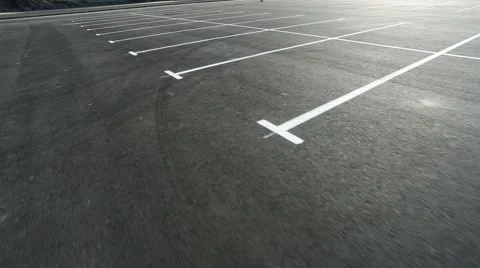 Movement in an empty parking lot shot on steadicam Stock Footage 41628510