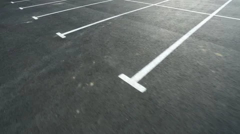 Movement in an empty parking lot shot on steadicam Stock Footage 41628554