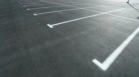 Movement in an empty parking lot shot on steadicam Stock Footage 41628629