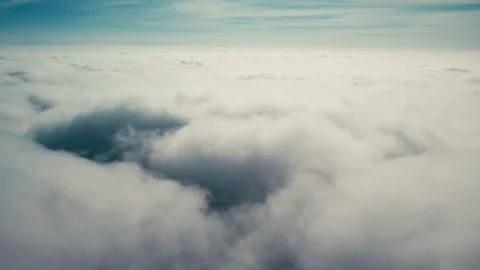 Movement flying over thick clouds Stock Footage 274310361