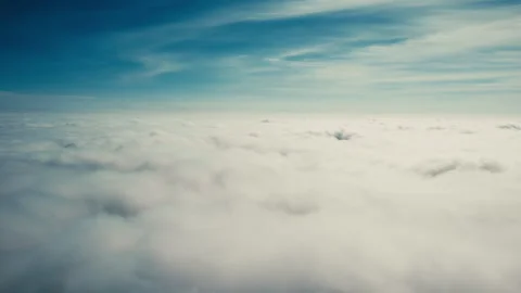 Movement flying over thick clouds Stock Footage 274310372