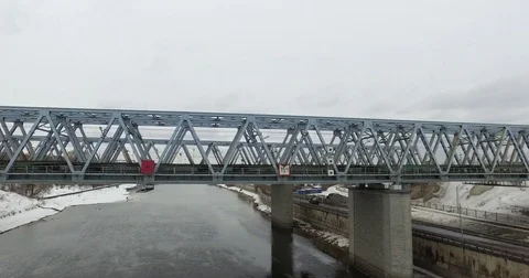 Movement of freight train through the railway bridge Stock Footage 72908196