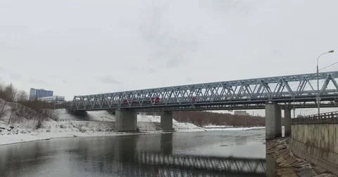 Movement of freight train through the railway bridge Stock Footage 72908233