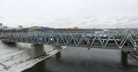 Movement of freight train through the railway bridge Stock Footage 72908536
