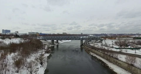 Movement of freight train through the railway bridge Stock Footage 72909025