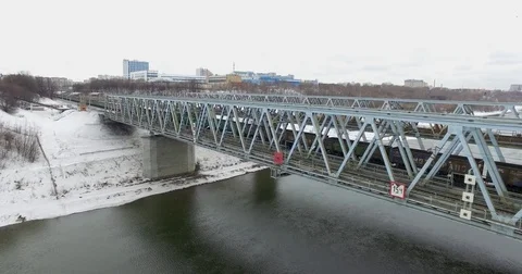 Movement of freight train through the railway bridge Stock Footage 72909400