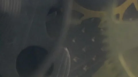 The movement of gears in hours Stock Footage 54665043