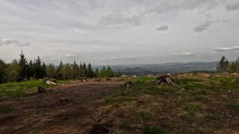 Movement of grey rain solid clouds over mountain valley in spring. Rudawski Park Stock Footage 295189088