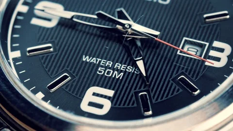 The movement of the hands of a wristwatch. Video stock 112943568