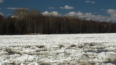 The movement of ice floes on the river during an ice drift in the spring. Stock Footage 88537757