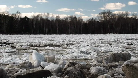 The movement of ice floes on the river during an ice drift in the spring. Stock Footage 88538009