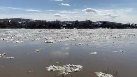 The movement of ice floes on the river during an ice drift in the spring. Stock Footage 152520887