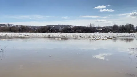 The movement of ice floes on the river during an ice drift in the spring. Stock Footage 152520925