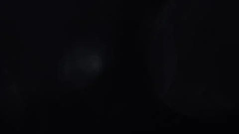 The movement of irregular moving lights in the darkness Video stock 318836408