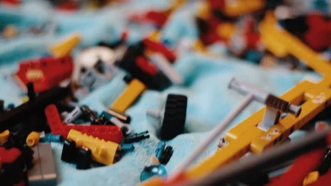 Movement from lego to a boy playing Video stock 91772824