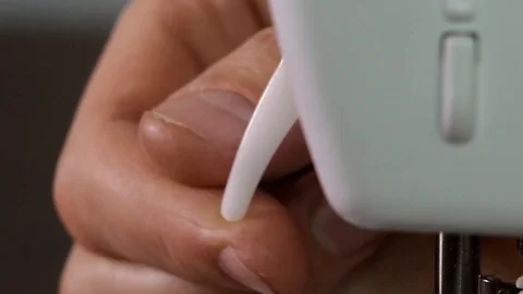 Movement of the lowering arm of the sewing machine foot Stock Footage 82467009