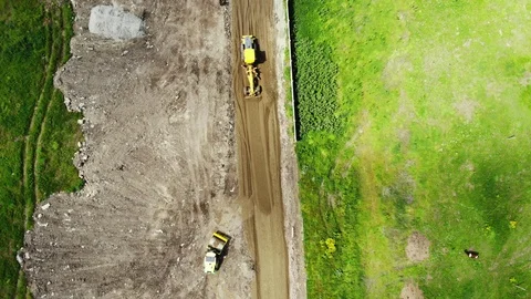 The movement of machinery. Aerial view of the construction road. Stock Footage 111529360