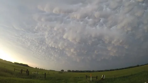 Movement of mammatus clouds at the back of a severe thunderstorm Stock Footage 114682786