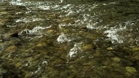 The movement of a mountain river over rocks Stock Footage 280573707
