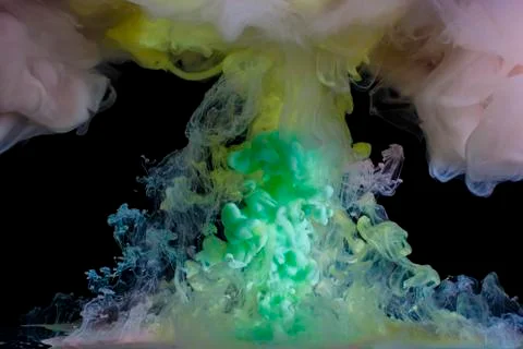 Movement multicolored paint in liquid Foto stock