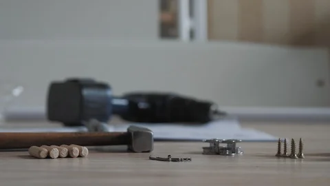 Movement Near The Tools Lying On The Floor For Repair And Assembly Of Furniture Stock-Footage 116251530